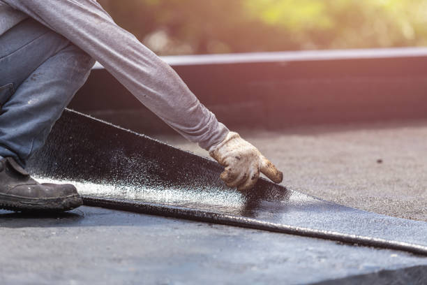 Professional Waterproofing technician working in Allendale, MI